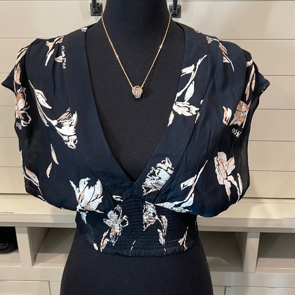 FP Movement by Free People Tops - Free People size small blouse. Throw a cami under it or wear it alone. So cute.